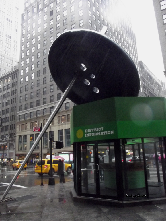 Giant Needle and Button near the Tourist Info Center on Fashion Walk of Fame